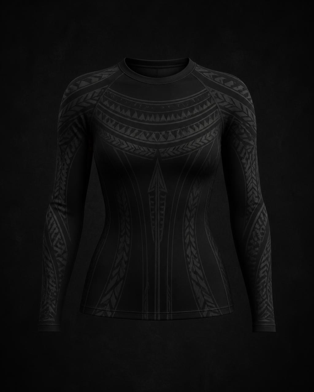 Black Wahine compression long sleeve with a Niho Mano sleeve band